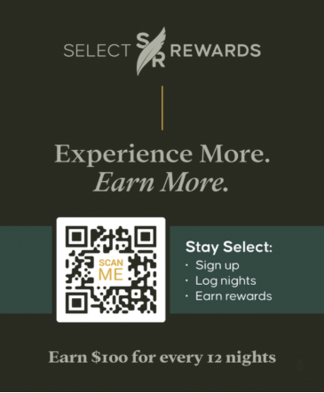 Image of a black and grey sign for Select Rewards with QR code